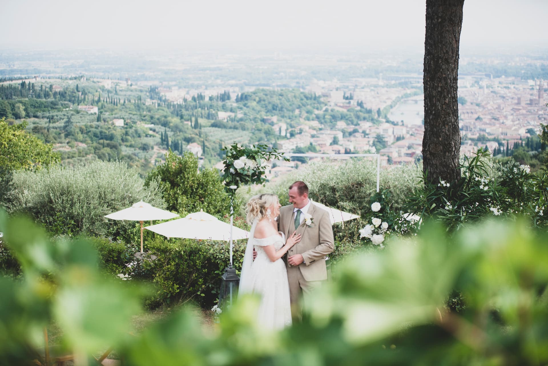 Claudia and Chris in the gardens at Corte San Mattia with Verona behind them