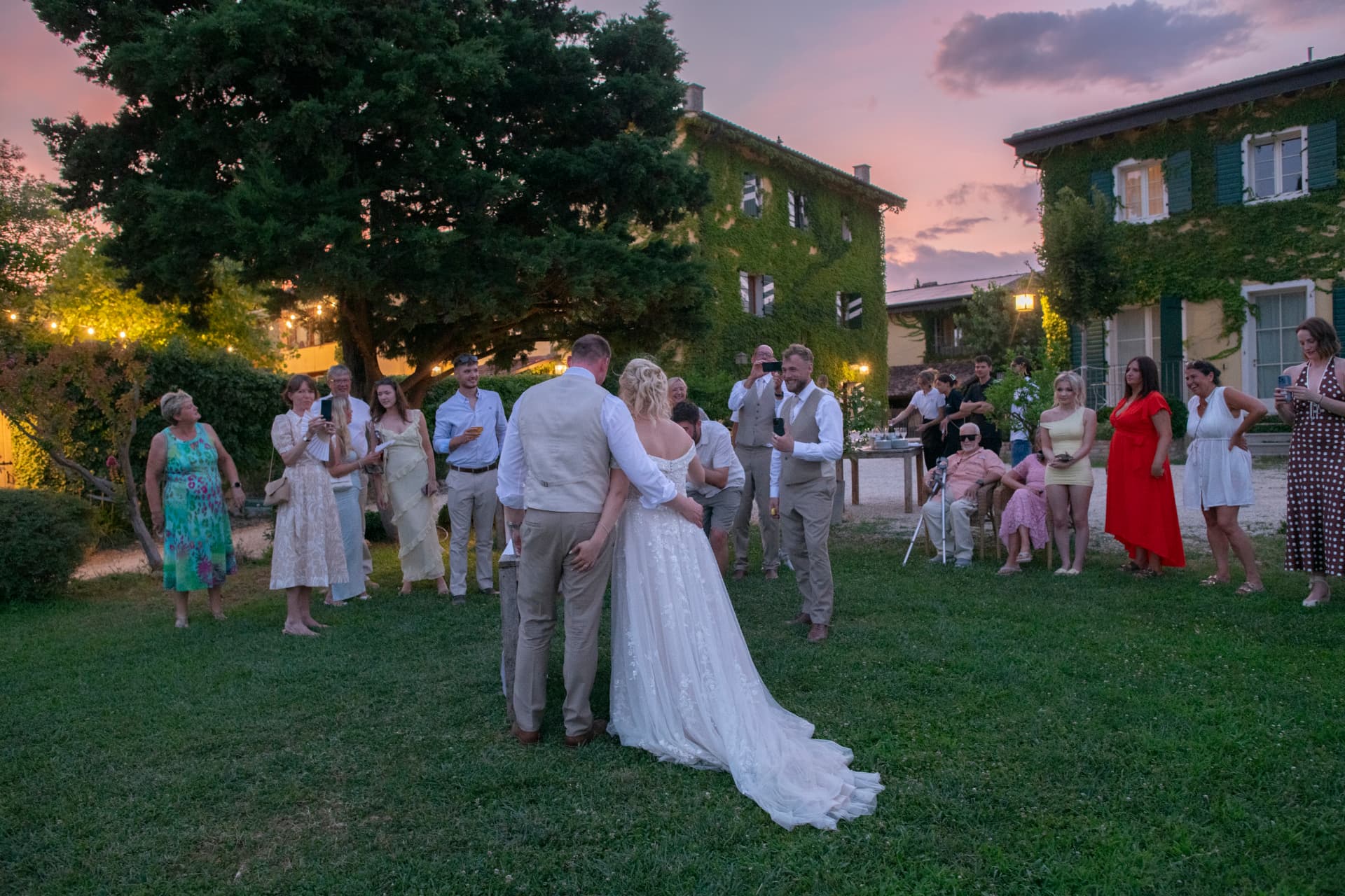 Claudia and Chris' first dance at sunset in front of their guests