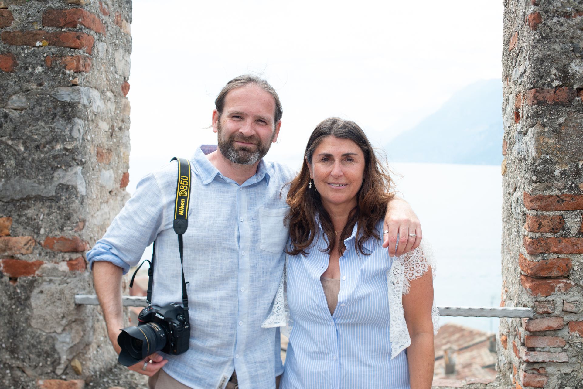 Dulcie and Nathan together with Lake Garda behind them